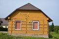 Begin instaling wooden planks on old house for insulation materials