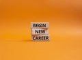 Begin new career symbol. Concept word Begin new career on wooden blocks. Beautiful orange background. Business and Begin new Royalty Free Stock Photo