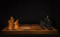 The beginning of the chess game. An old chessboard with pieces Royalty Free Stock Photo
