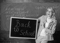 Beginning of new school season. Woman teacher holds blackboard inscription back to school. Are you ready to study. Lady Royalty Free Stock Photo