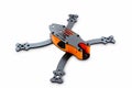 The beginning of the racing drone assembly. Durable frame of an unmanned aerial vehicle, made of carbon fiber and 3d printing, iso Royalty Free Stock Photo