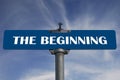 The beginning road sign