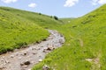 the beginning of summer , the sources of the mountain river walking along the canyon , relaxing in the mountains.