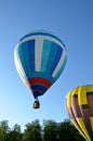 The beginning of the takeoff of hot air balloons, view from the ground Royalty Free Stock Photo