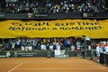 Beginning of a tennis match. Crowd singing national anthem Royalty Free Stock Photo