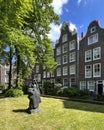 Beguin statue in the Begijnhof in Amsterdam Royalty Free Stock Photo