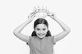 Behaving like princess is work. Kid wear golden crown symbol of princess. Girl cute child wear crown. Childhood concept Royalty Free Stock Photo