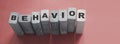 Behavior Word In Wooden Cube. Psychology human resources management concept Royalty Free Stock Photo