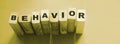 Behavior Word In Wooden Cube. Psychology human resources management concept Royalty Free Stock Photo