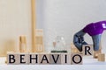 BEHAVIOR word written on wood block. BEHAVIOR text on wooden table for your desing, concept