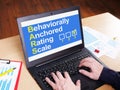 Behaviorally Anchored Rating Scale BARS is shown on the photo using the text