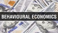 Behavioural economics text Concept Closeup. American Dollars Cash Money,3D rendering. Behavioural economics at Dollar Banknote. Royalty Free Stock Photo