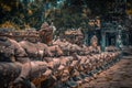 Beheaded statues at Preah Khan, Angkor, Cambodia Entrance