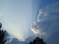 Behind this big cloud of rain and storm, the sun seems to want to return Royalty Free Stock Photo