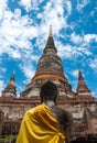Behind the buddha statue and old temple in Thailand Royalty Free Stock Photo