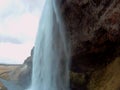 Behind the curtains of seljalandsfoss waterfall, iceland Royalty Free Stock Photo