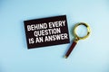 Behind Every Question is an Answer text with Magnifying glass on blue background Royalty Free Stock Photo