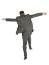 Behind jumping businessman Royalty Free Stock Photo