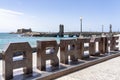 Behind the letters of the capital of Lanzarote Arrecife you see the old fortress Castillo de San Gabriel, Lanzarote, Spain