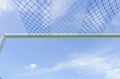 Behind the ropes of the outdoor soccer field goal net, the football goal background Royalty Free Stock Photo