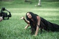 Woman in front of the camera on the film set outdoor location Royalty Free Stock Photo