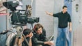 Behind the scene. Film crew filming movie scene in studio Royalty Free Stock Photo