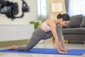 Behind the scenes of Fit young woman doing yoga and meditation at home, sport and healthy lifestyle concept Royalty Free Stock Photo