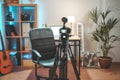 Behind the scenes at home shooting set with camera and lightning setting. Influencer`s amazing work space. Ready to start filming. Royalty Free Stock Photo