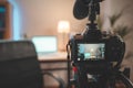 Behind the scenes at home shooting set with camera and lightning setting. Influencer`s amazing work space. Ready to start filming. Royalty Free Stock Photo