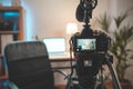 Behind the scenes at home shooting set with camera and lightning setting. Influencer`s amazing work space. Ready to start filming. Royalty Free Stock Photo