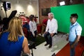 Behind the Scenes Interview with Ricard Branson on a green screen video tv recording set in a Virgin Mobile store