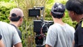 Behind the scenes of movie shooting or video production.