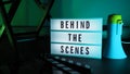 Behind the scenes text on letterboard Lightbox or Cinema Light box Royalty Free Stock Photo