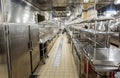 Behind the scenes view of food preparation in the kitchen, galley on board a large cruise ship at Sea in Queen Victori