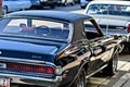 Behind shot of an old-fashioned black classic Rambler car in Downers Grove, United States