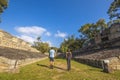 Behind shot of the tourists visiting Copan Ruinas and its beautiful Mayan ruins in Honduras Royalty Free Stock Photo