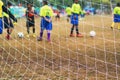 behind the soccer net with blure player Royalty Free Stock Photo