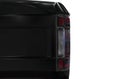 Behind view tail light black truck isolated on white background with clipping path