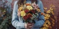 girl holding chrysanthemum flowers in her hands Royalty Free Stock Photo