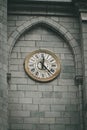 Timeless Tranquility: Medieval Church and Clock Tower in the Holy City of Lourdes Royalty Free Stock Photo
