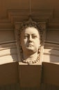 Beige arch keystone of sculpted rock Queen Victoria head relief on historic Custom House, Circular Quay, Sydney, NSW, Australia