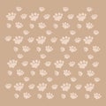 Beige background with pet paws.