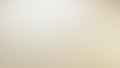 A beige background with a subtle gradient effect and a textured surface that appears slightly grainy and rough providing a Royalty Free Stock Photo