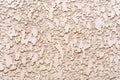 Beige background or texture - plastered wall with ornament Royalty Free Stock Photo