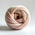 Beige Ball of Yarn on White Background for Crafts and Textile Projects Royalty Free Stock Photo