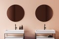 Beige bathroom interior with double sink, close up Royalty Free Stock Photo