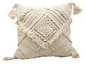 Beige bohemian decorative throw pillow with intricate macrame patterns, isolated on white background. Detailed texture Royalty Free Stock Photo