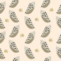 Beige and brown dot seashell hand drawn seamless patterm on beige background