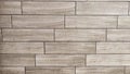 Beige brown wooden planks, strips wall cladding interior panel of natural wood. Laminate sheet floor tiles, random Royalty Free Stock Photo