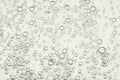Beige bubbles flows to the surface Royalty Free Stock Photo